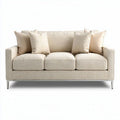 Beige fabric sofa with decorative pillows for living room seating 200 x 90 x 85cm